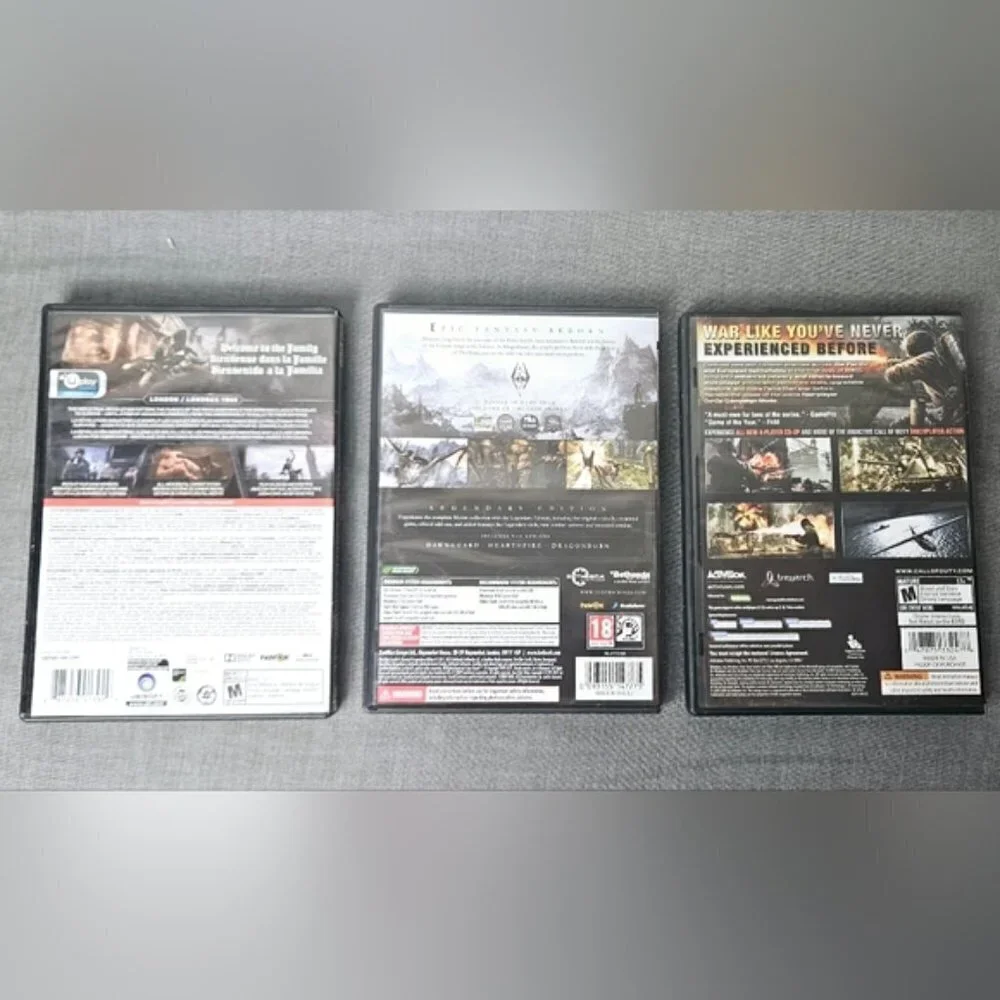 7 Mixed PC Games, Skyrim, Assassin's Creed, Call of Duty, Farcry, FEAR, + 2 More